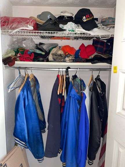 Entryway closet. Featuring vintage jackets. Mostly size, large and extra large and gloves and hats.