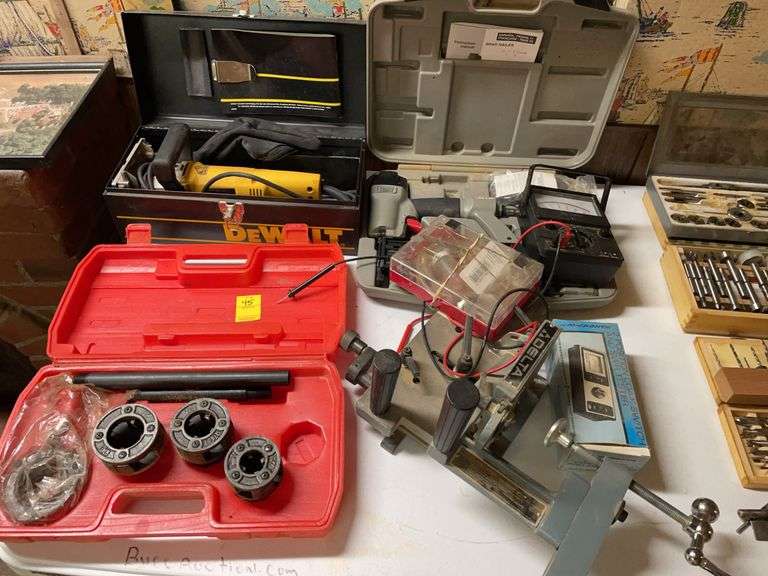 Basement. Lot of miscellaneous tool items. Voltmeter. Pneumatic Brad nailer. Other items.