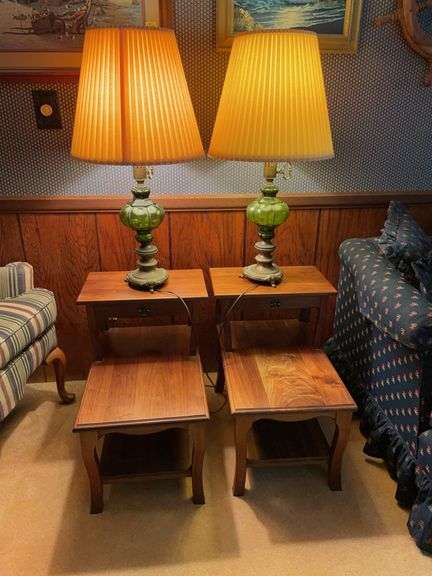 Living room. Matching two tier end tables with matching decorative glass lamps.
