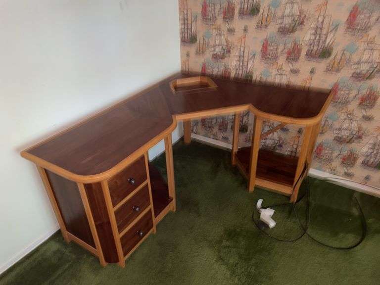 Content of back bedroom. Furniture lot. Unique custom-made computer desk. Curio dresser. Desk with chair. Leather computer chair. Two vintage dressers. A lamp a bookcase and whatever items remain in this room take what you want. Leave the rest.