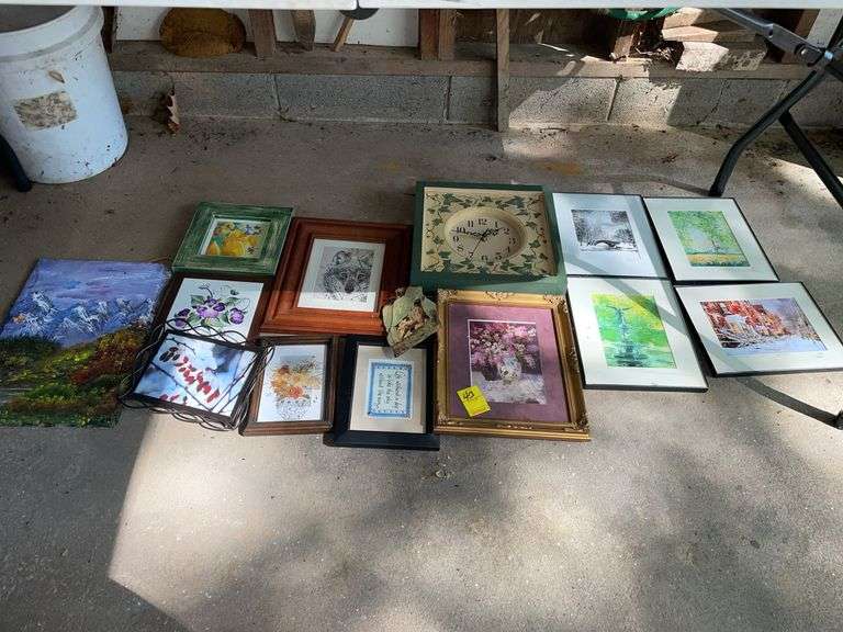 Garage. Lot of framed pieces. Clock.