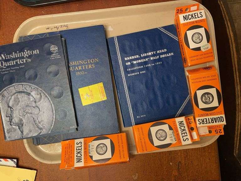 Coin collector supply lot. Washington Quarter, booklets and liberty and Morgan booklet. With quarter and nickel coin mounts. Note this lot does not have any coins.