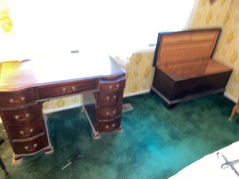 Master bedroom. Vintage desk and cavalier cedar chest.