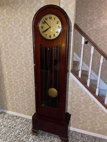 Vintage mission style clock. Movement operates and chimes some loss.