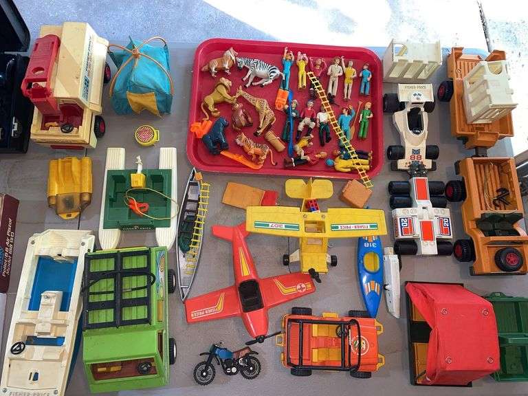 Garage. Vintage fisher price lot. Vehicles, figures, animals, tense accessories and more.