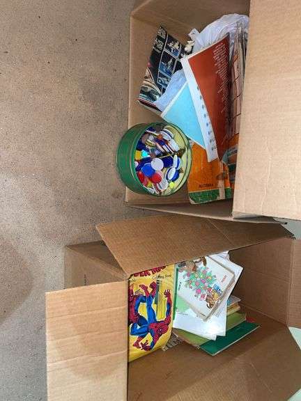 Garage. Two boxes of vintage books. Some toys and poker chips.