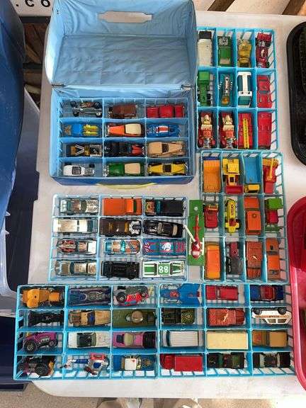 Garage. Matchbox carry case with  six trays of toy vehicles. Review photo for close-ups. Some toy vehicles may not be matchbox. Keep this in mind. Review at preview.