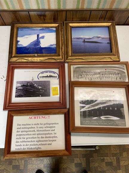 Basement. Naval photographs and German humor.