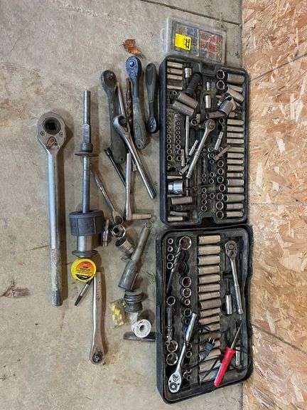 Socket sets by Pittsburgh, metric set and standard set, half inch drive with some extra tools. Check for complete