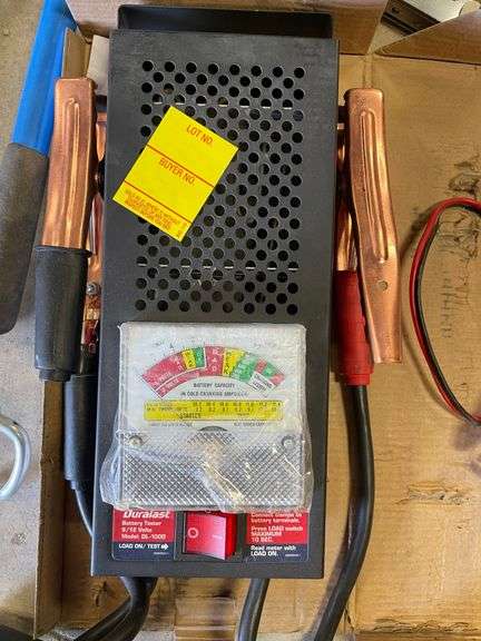 ￼ lot includes battery, tester, battery, charger, electrical tools, stapler, cords, and miscellaneous