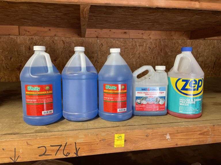 lot of windshield and power washing fluid