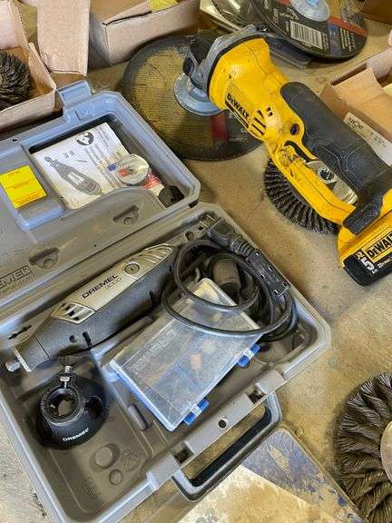 DeWalt cordless hand grinder which works and Dremel 3000 tool. Includes nice lot of wire wheels and grinding wheels.