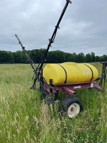 Demco model HCM. 300 gallon tub pull behind pesticide sprayer.