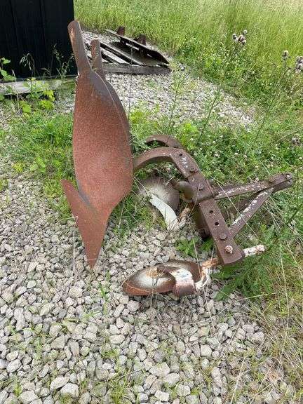 Old two bottom farm plow for farm mall tractor. Pull type.