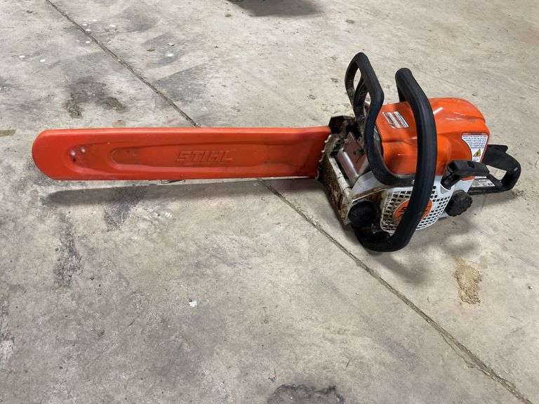 Still, MS170 chainsaw with cover