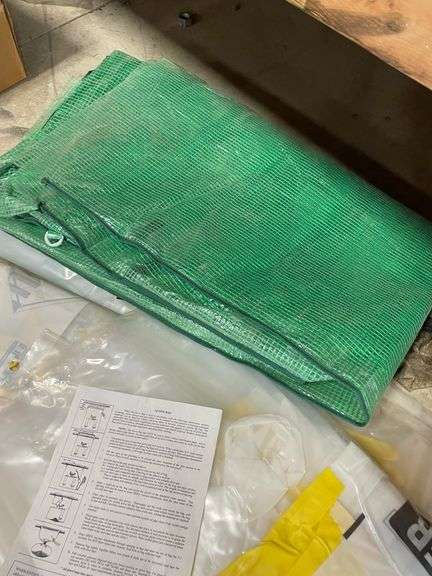 Five each hazmat glove bags, new. Also includes tarp by the piece.