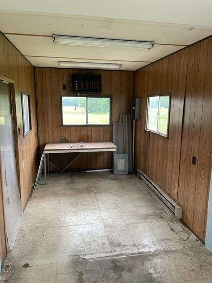 Single axle construction trailer. Approximately 8‘ x 24‘. Wired for electric and AC. Interior needs work/finished. Shell only. Vinyl sided. With steps. not sure of ball size