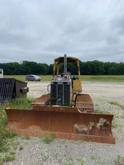 John Deere 450 H Krekeler/dozer. Steel tracked. Manufactured approximately 1999 to 2004. Open canopy ROPS. Approximately 70 hp diesel engine. 8762 hours showing on meter. See photos for video of vehicle running-$1,000 Credit Card Deposit. Balance by Cash, Certified Check or ACH within 48 hours after sale.