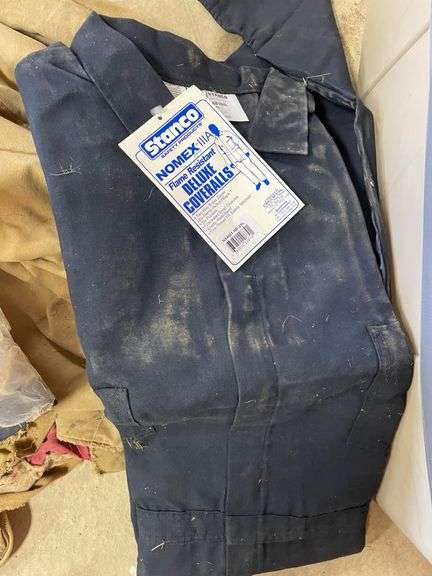 4xl and 3xl unused deluxe coveralls, used cover all and nice selection of new work gloves in tub