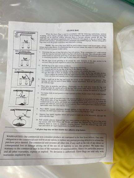 Five each hazmat glove bags, new. Also includes tarp by the piece.