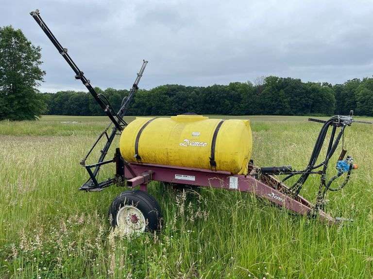 Demco model HCM. 300 gallon tub pull behind pesticide sprayer.