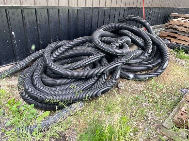 Large lot of corrugated drainage hose