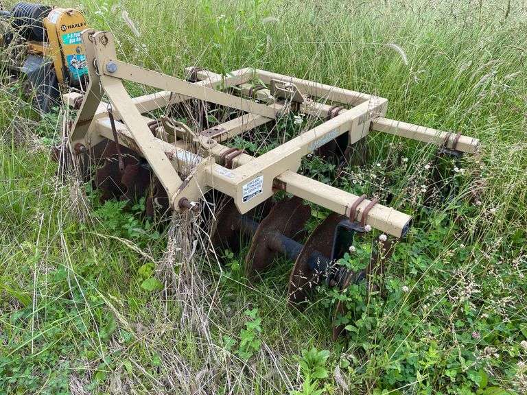 Land pride three point. 6 foot rear notched farm disc. With quick hitch.