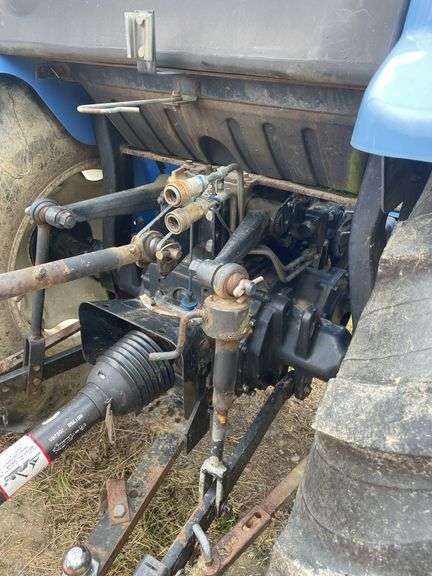 New Holland TC 40 a compact 4 x 4 utility tractor boom series. MFG. 2003–2008 Shibaura 2.0 L four cycle diesel engine. 12 speed synchronize shuttle . Approximately 40 hp engine. 540 independent rear, PTO/2000 mid. PTO. Three point rear hitch. Four-wheel-drive. Serial number G609606.1006 hours on meter. In use to maintain lawn so hours meter may vary. More Photos Coming.
