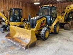 CAT 420E wheeled backhoe/loader. Included air hammer and extra bucket. Full cab. Diesel engine. 93 gross HP. 18 foot dig depth. 8 foot bucket. 1124 hours on meter. Product ID number CT0420EJDJL03017. Serial number C4E21563F1J07325. Garage kept. See photos for video of vehicle running-$1,000 Credit Card Deposit. Balance by Cash, Certified Check or ACH within 48 hours after sale.