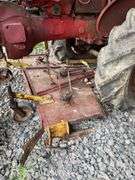 1959 Farmall model a wide front utility road tractor. 2 Wheel Dr. Gasoline engine. With attached Undermount belly mower. Serial number 3A2159