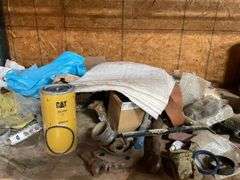 Contents of four post shelving includes oil, change, accessories, and filters for big machinery, miscellaneous hardware, fittings, scrap metal. Take what you want and leave the rest.