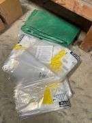 Five each hazmat glove bags, new. Also includes tarp by the piece.