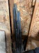 Nice lot of black pipe, track, boards, plow discs misc
