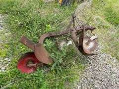 Old two bottom farm plow for farm mall tractor. Pull type.