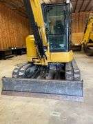 CAT 305E CR. Compact mini track excavator. Rubber tracks. Approximately 40.2 hp. Cat C2 .4 diesel engine. 129 inch dig depth. 220 inch reach. Full cab with 78 inch blade 24 inch bucket with thumb. 189 hours on meter. Product ID number CAT0305EVH5M11929. Stored in garage. See Photos for Video of Vehicle running-$1,000 Credit Card Deposit. Balance by Cash, Certified Check or ACH within 48 hours after sale.