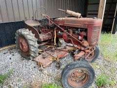 1959 Farmall model a wide front utility road tractor. 2 Wheel Dr. Gasoline engine. With attached Undermount belly mower. Serial number 3A2159