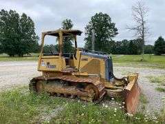 John Deere 450 H Krekeler/dozer. Steel tracked. Manufactured approximately 1999 to 2004. Open canopy ROPS. Approximately 70 hp diesel engine. 8762 hours showing on meter. See photos for video of vehicle running-$1,000 Credit Card Deposit. Balance by Cash, Certified Check or ACH within 48 hours after sale.