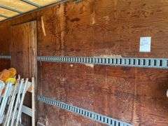 Supreme aluminum cargo box only approximately 8’ x 30’. Roll up rear door. No frame or axles. Sitting on ground used a storage shed. Does not include the contents.