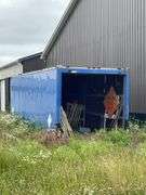 Supreme aluminum cargo box only approximately 8’ x 30’. Roll up rear door. No frame or axles. Sitting on ground used a storage shed. Does not include the contents.
