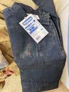 4xl and 3xl unused deluxe coveralls, used cover all and nice selection of new work gloves in tub
