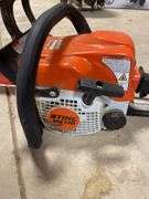 Still, MS170 chainsaw with cover