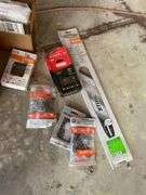 A lot of chainsaw, blades, tool and miscellaneous accessories
