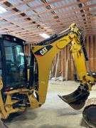 CAT 420E wheeled backhoe/loader. Included air hammer and extra bucket. Full cab. Diesel engine. 93 gross HP. 18 foot dig depth. 8 foot bucket. 1124 hours on meter. Product ID number CT0420EJDJL03017. Serial number C4E21563F1J07325. Garage kept. See photos for video of vehicle running-$1,000 Credit Card Deposit. Balance by Cash, Certified Check or ACH within 48 hours after sale.