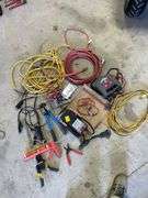 ￼ lot includes battery, tester, battery, charger, electrical tools, stapler, cords, and miscellaneous