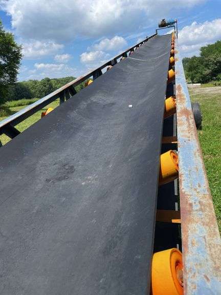 Better portable radio stacking conveyor model number BE3660C. 60 foot long electric powered. -$1000 deposit, balance in ACH or certified check within 48 hours of auction close