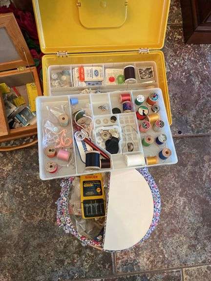 Entryway. Sewing essentials and pho flowers.