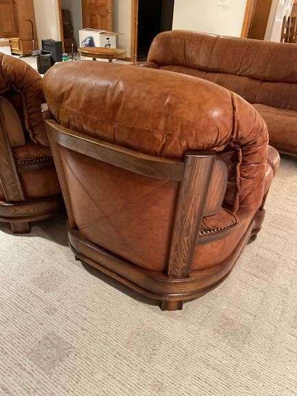 Basement. Assuming Ligne Mur. Well-made leather furniture, set sofa two side, chairs and ottomans. (One ottoman found later not pictured) Some Loss review the photos. But high quality furniture set.