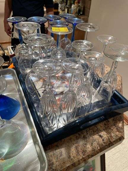 Basement. Two trays of stemware including crystal wine glasses