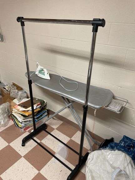 Iron with ironing board and rolling wardrobe