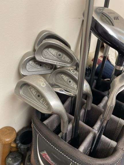 Ping Eye two golf clubs, miscellaneous baseball bats.